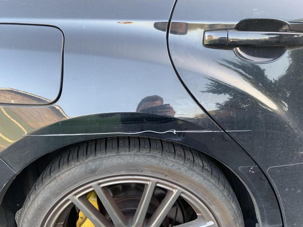 Damage to car.jpg